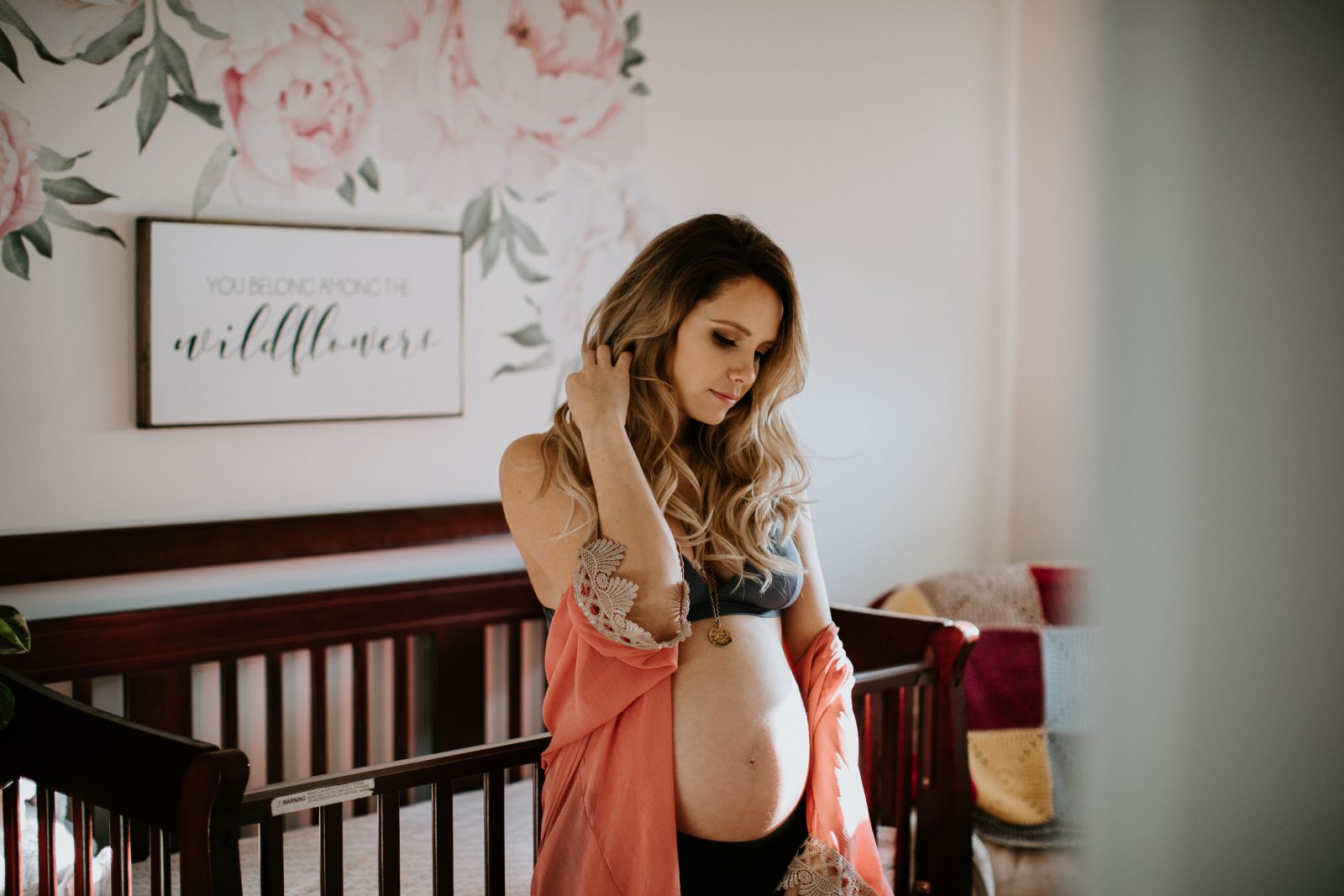 edmonton maternity photographer in home maternity session with cute couple