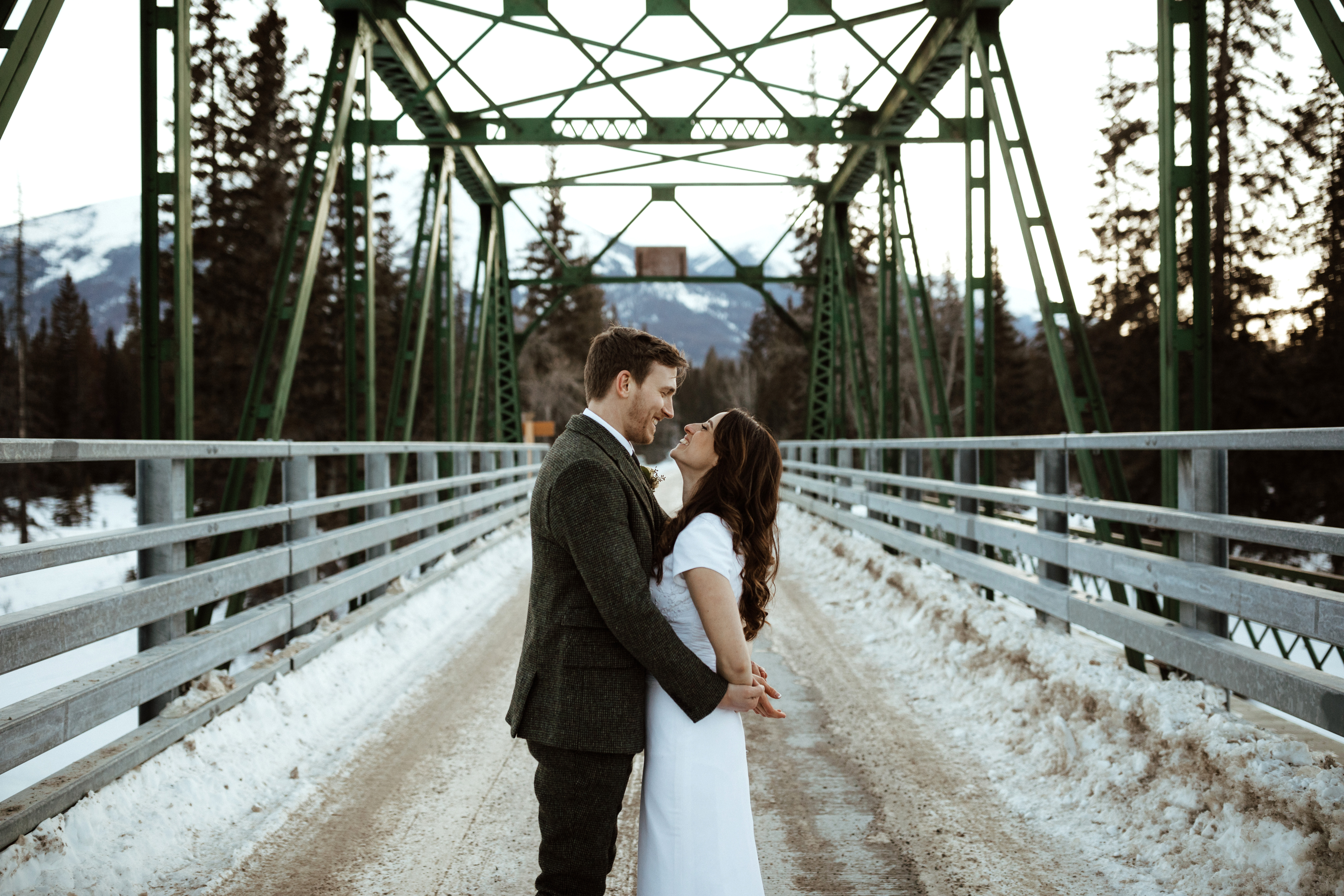 outdoorsy and adventurous young couple Elope in the Mountains of Jasper National Park Alberta in the Winter