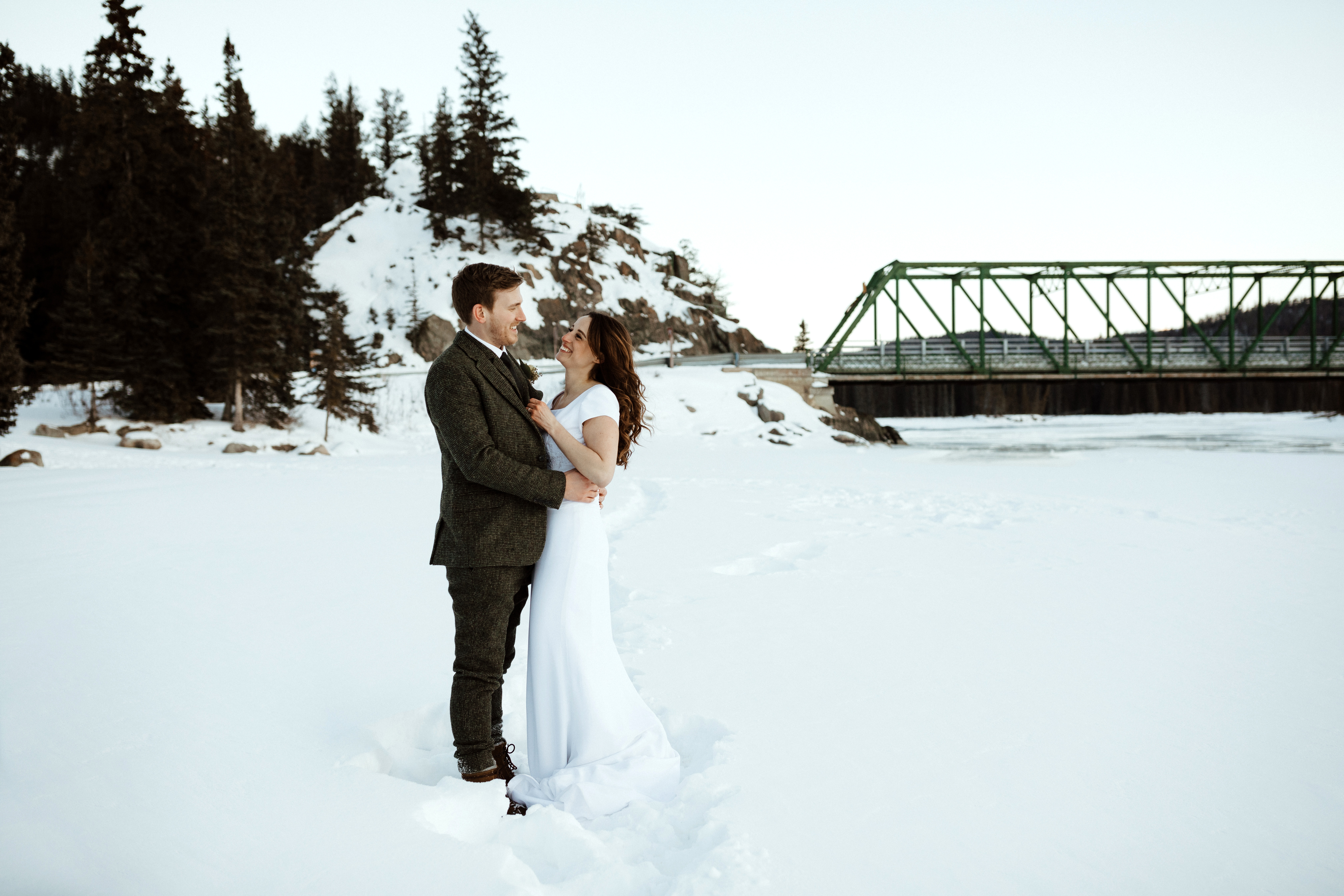 outdoorsy and adventurous young couple Elope in the Mountains of Jasper National Park Alberta in the Winter