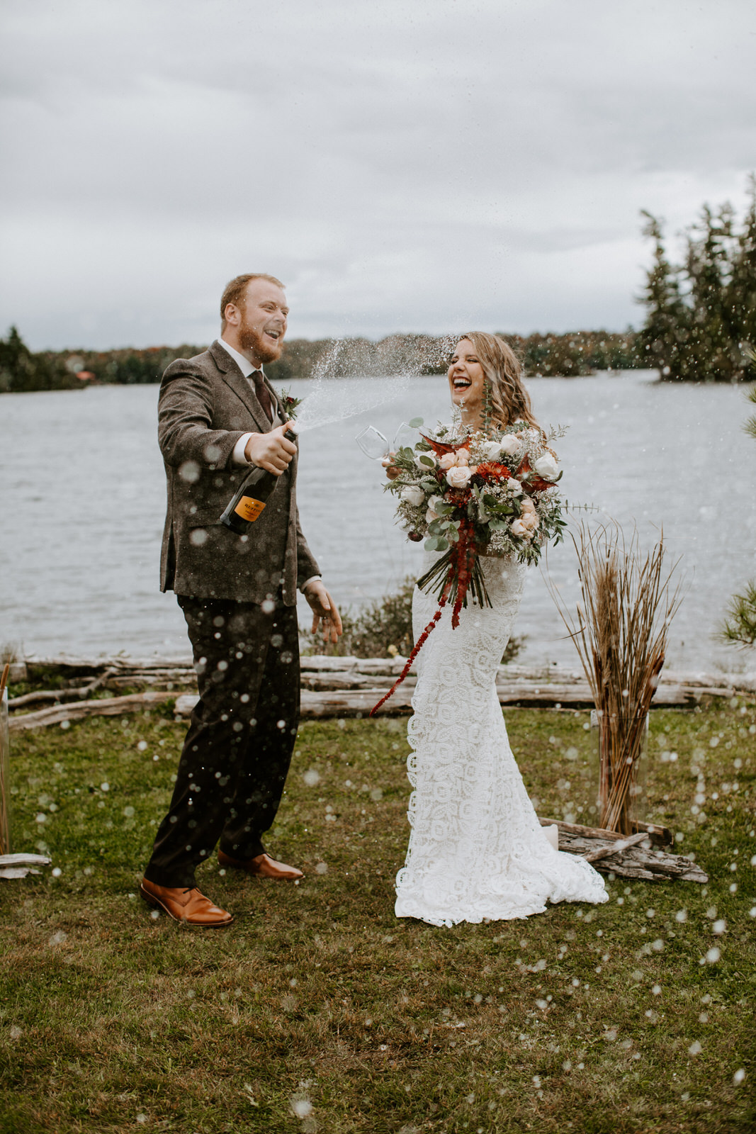parry sound intimate wedding couple pops champagne after getting married