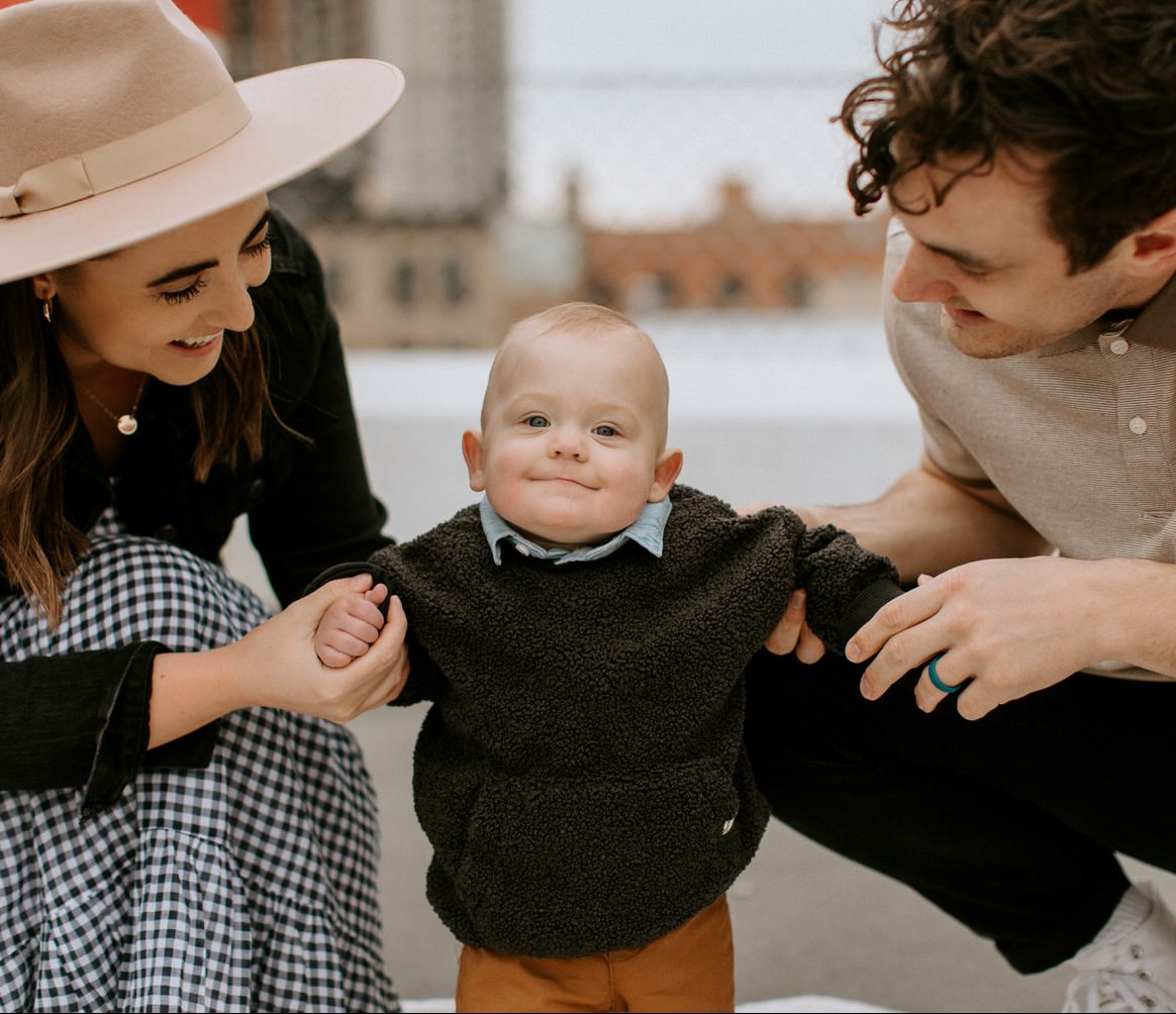 urban family session on a rooftop with their baby