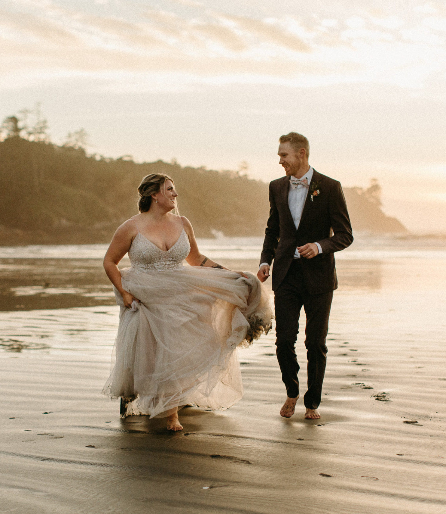 Tofino Elopement Couple Running Barefoot on Cox Bay Beach